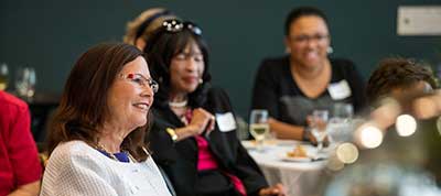 photo of attendees at women helping women event