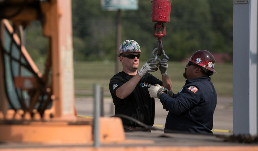 UA workers using a crane